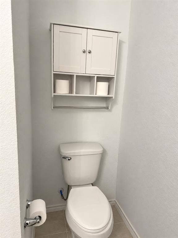 5719 Huffines Boulevard, Royse City, TX 75189 White wall-mounted cabinet with open shelving and towel bar