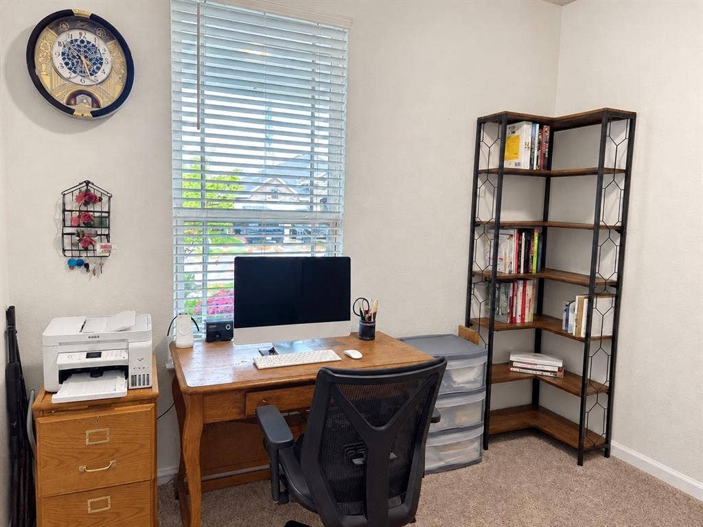 5719 Huffines Boulevard, Royse City, TX 75189 Neutral wall color, carpeted flooring, window with horizontal blinds, built-in corner shelving unit