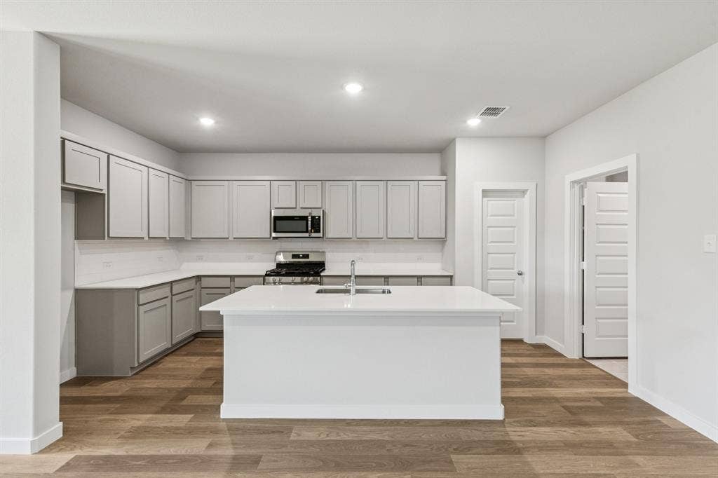 Kitchen in the Oscar home plan – REPRESENTATIVE PHOTO