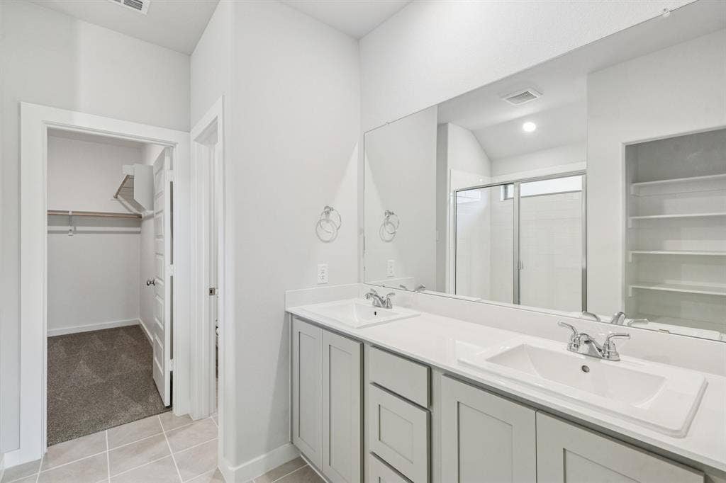 Primary Bathroom in the Oscar home plan – REPRESENTATIVE PHOTO