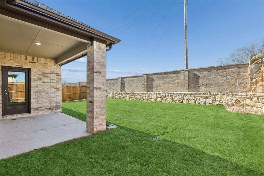 2308 Warm Glow Way, Princeton, TX 75407 Patio in the Holden home plan – REPRESENTATIVE PHOTO