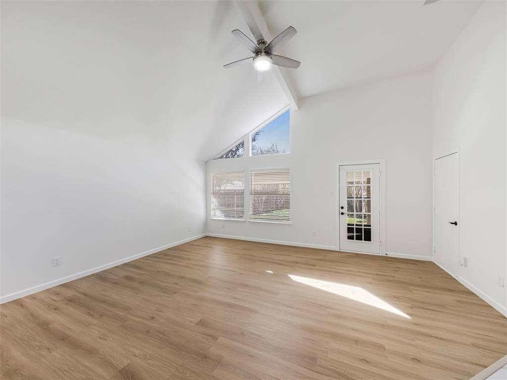 2327 N Ridge Road, McKinney, TX 75072 Vaulted ceiling, ceiling fan, wood-finish flooring, French door, and large windows