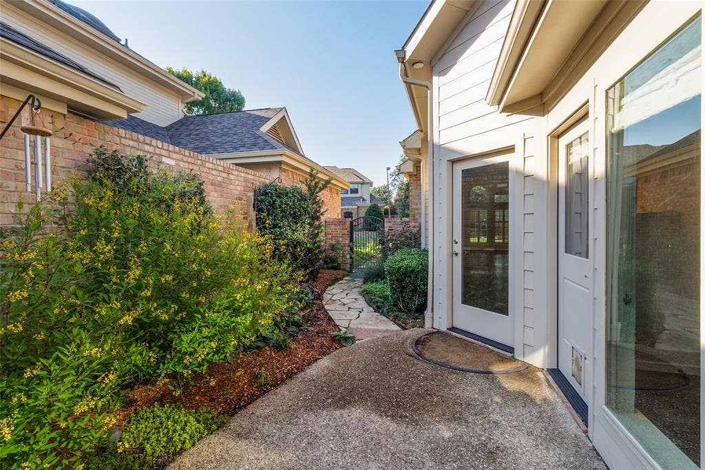 Patio and private sideyard off Primary and Family Room