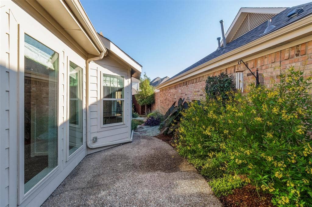 Patio and private sideyard off Primary and Family Room