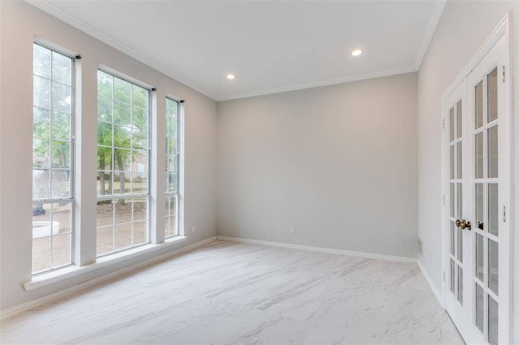 6315 Millwood Court, Arlington, TX 76016 Triple pane windows, recessed lighting, crown molding, double French doors, and tile flooring