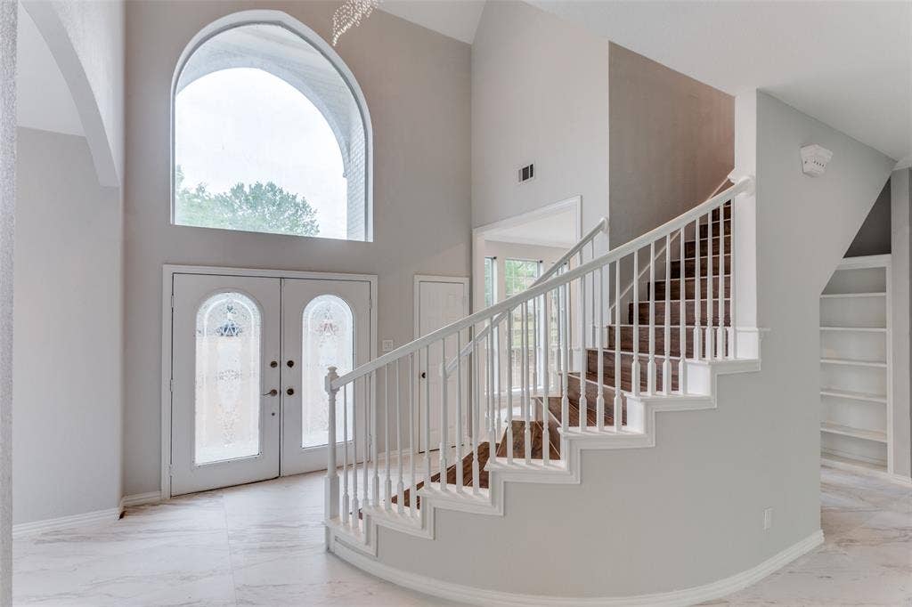 6315 Millwood Court, Arlington, TX 76016 Arched transom window above double entry doors with decorative glass