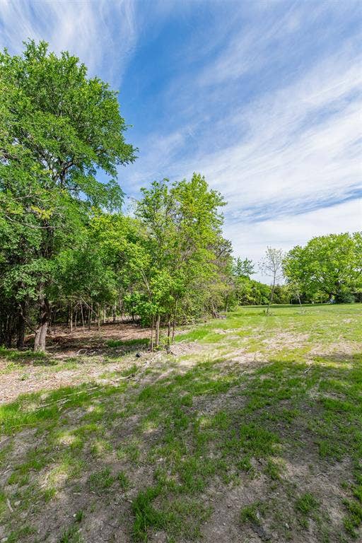 1603 Smirl Drive, Heath, TX 75032 Expansive pastoral setting with mature shade trees and open grounds