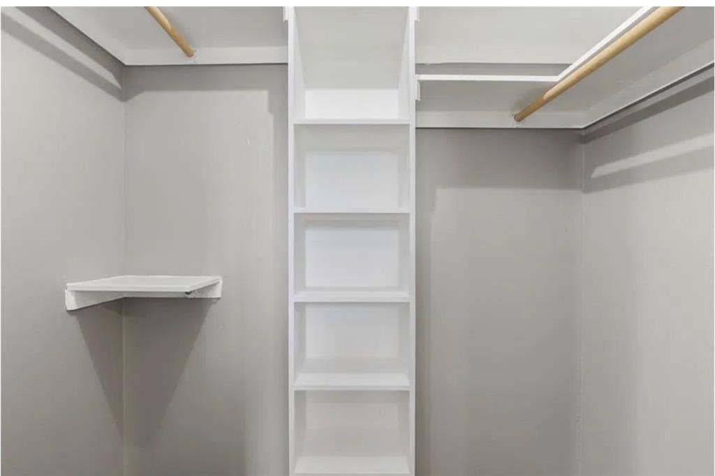 8943 Camfield Way, Frisco, TX 75033 Built-in shelving unit, corner shelf, and two clothing rods