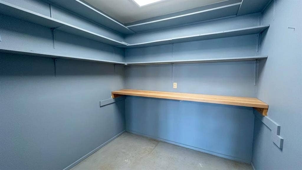 Separate inside shop, storage off garage.