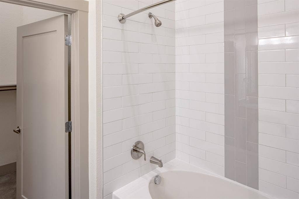 601 N Oak Street, #118, Roanoke, TX 76262 Bathroom with tiled shower / bath