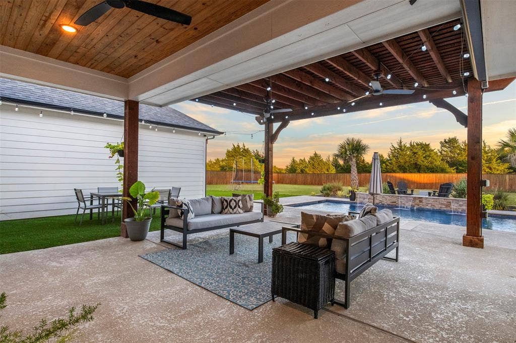 1220 Lynn Way, Waxahachie, TX 75165 Extended cedar pergola creates additional shaded entertaining space.