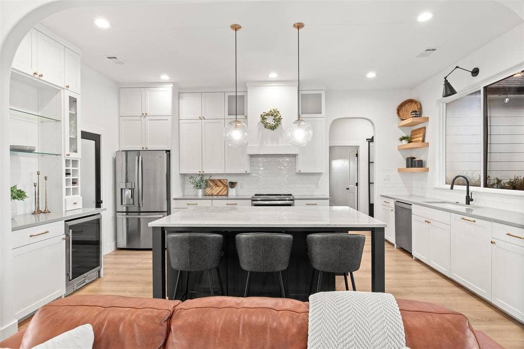 1220 Lynn Way, Waxahachie, TX 75165 Dedicated beverage station with built-in undercounter refrigerator.