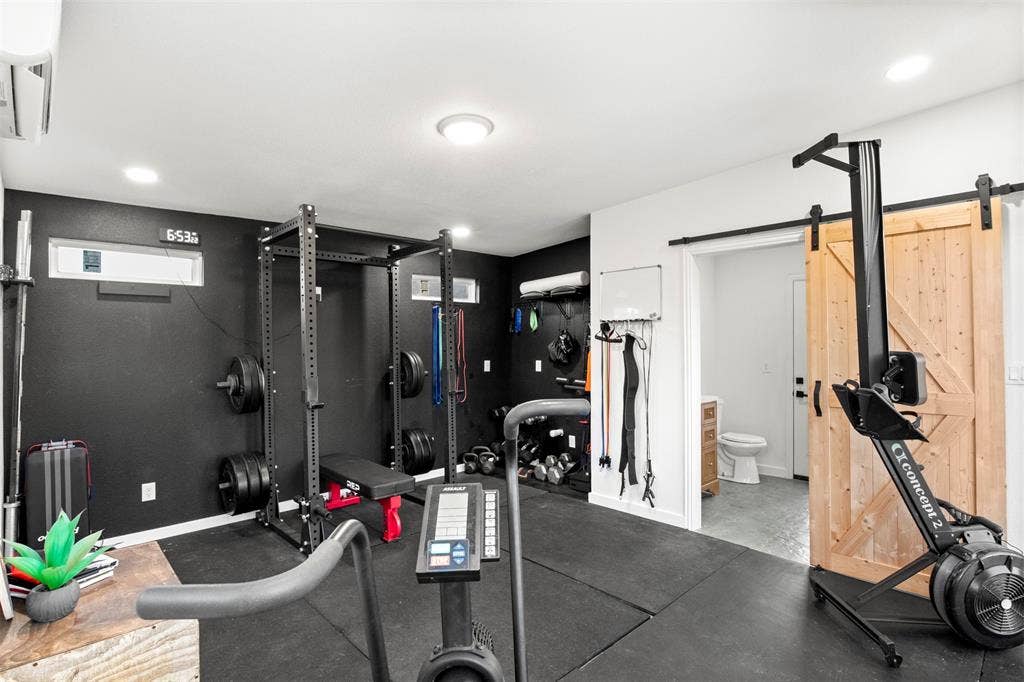 1220 Lynn Way, Waxahachie, TX 75165 Currently configured as a private gym with room for exercise equipment. or flexible use.