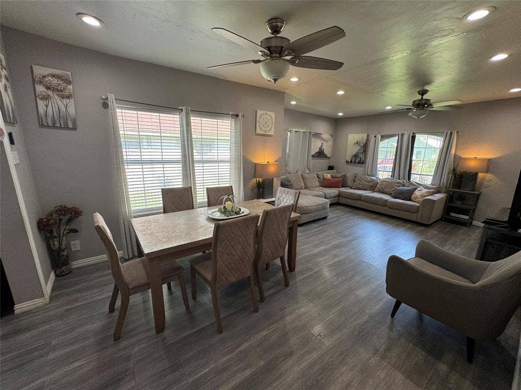 407 S Garrett Avenue, Dallas, TX 75223 Dining room with recessed lighting, ceiling fan, and dark wood-style flooring
