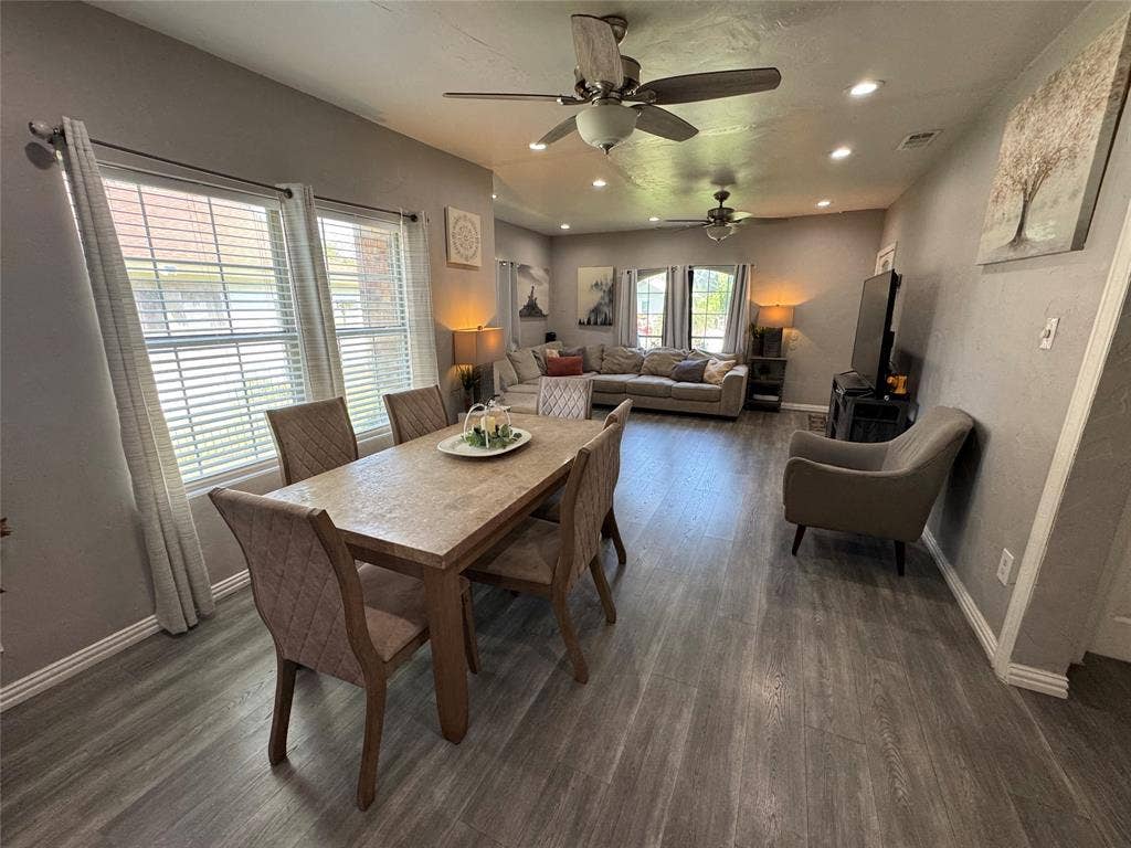407 S Garrett Avenue, Dallas, TX 75223 Dining room featuring recessed lighting, ceiling fan, dark wood finished floors, and a textured wall
