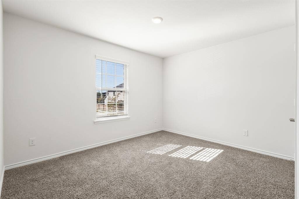 1536 Estivella Drive, Little Elm, TX 75068 Recessed lighting, neutral wall paint, window with blinds, and carpeted flooring