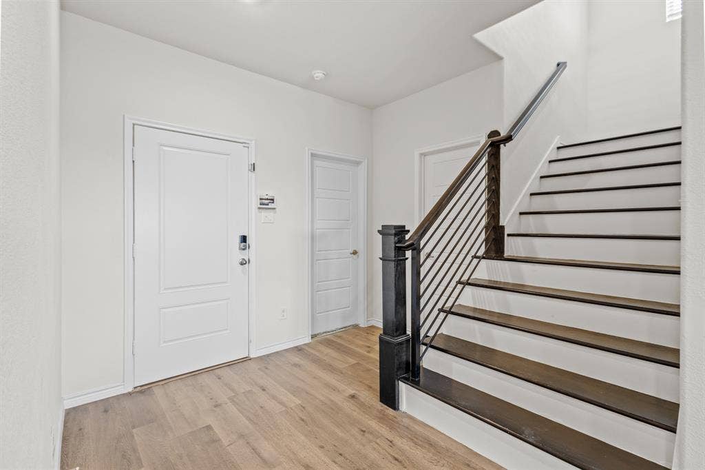 1536 Estivella Drive, Little Elm, TX 75068 Wood-finish flooring throughout the entryway