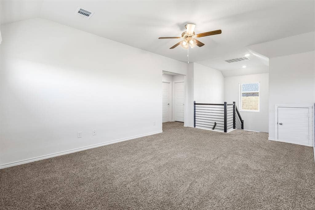 1536 Estivella Drive, Little Elm, TX 75068 Spacious carpeted area with a ceiling fan and recessed lighting