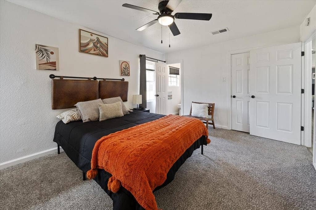 5920 Tourist Drive, North Richland Hills, TX 76117 Primary bedroom with half bath.
