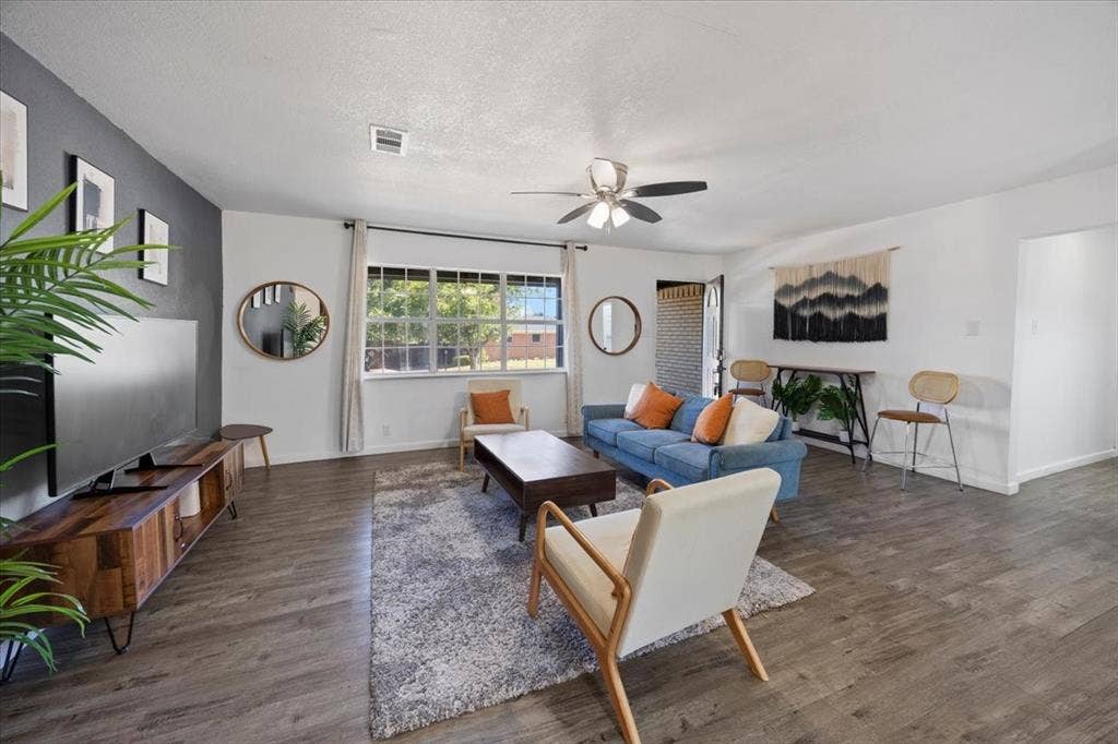 5920 Tourist Drive, North Richland Hills, TX 76117 Step into a spacious, bright living room.
