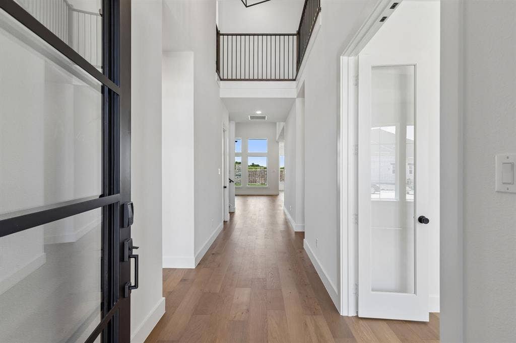 Featuring a modern four panel glass front door, high ceilings and sight lines from the front through to the rear of the home, this dream home offers a stunning entrance for to welcome friends and family into your forever home!