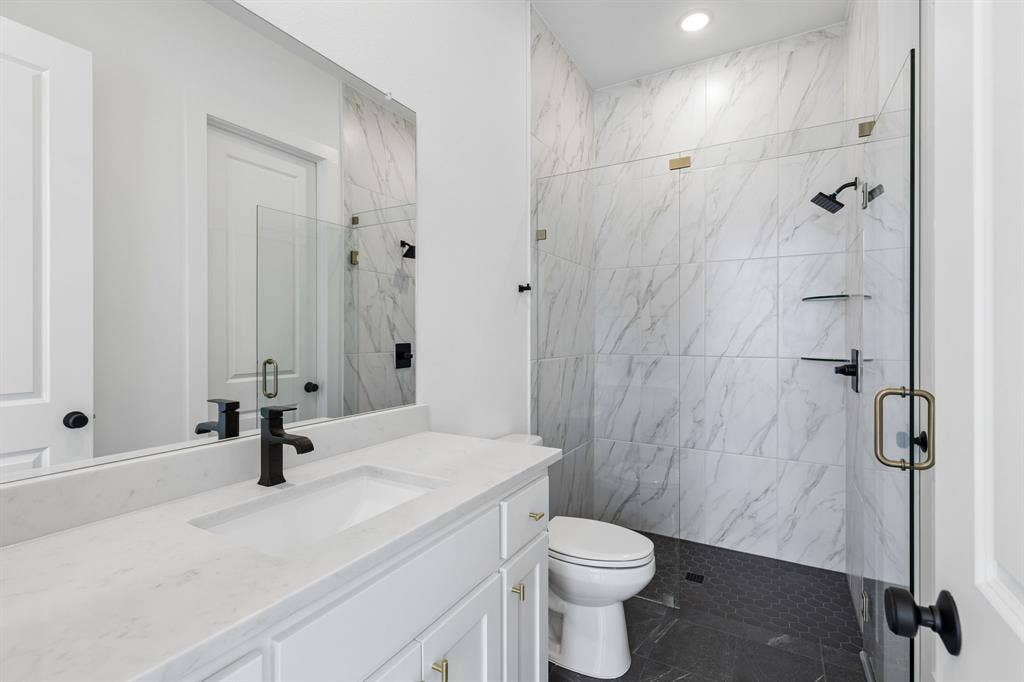 Friends and family will feel right at home in any of the beautifully finished guest baths this dream home has to offer!
