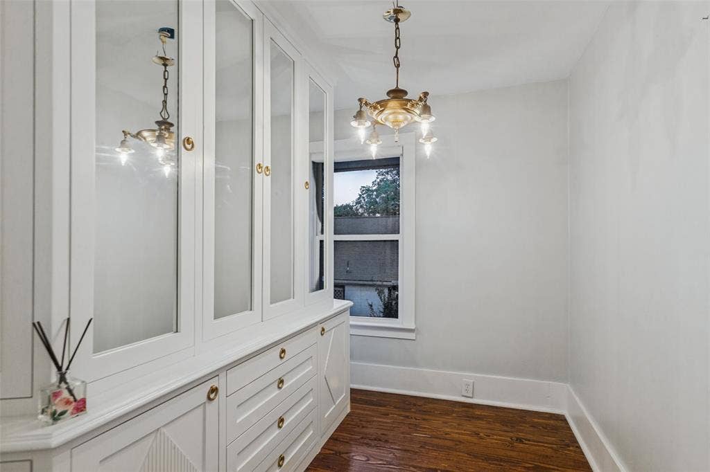 506 W Virginia Street, McKinney, TX 75069 Dressing room with built-in storage, could double as second walk in closet off primary bedroom with bars installed