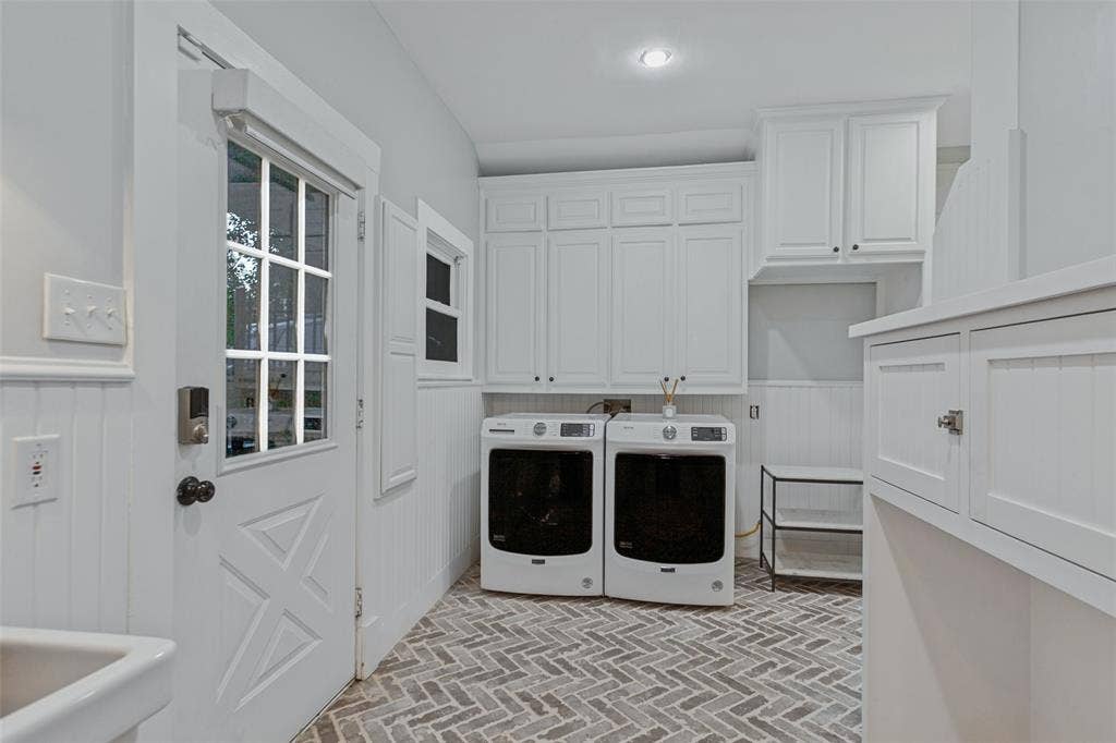 506 W Virginia Street, McKinney, TX 75069 Utility room equipped with washer, dryer, sink, and storage. Room for second refrigerator or folding table