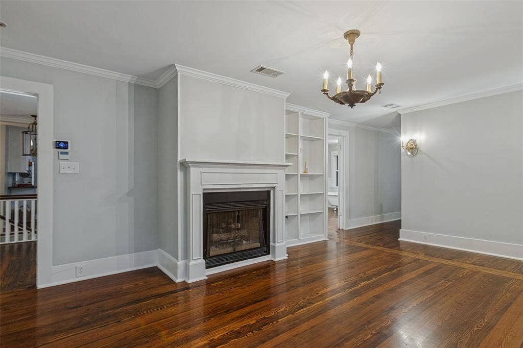 506 W Virginia Street, McKinney, TX 75069 Primary suite with walk in closet, ensuite bathroom, built-in shelving, fireplace and dressing room