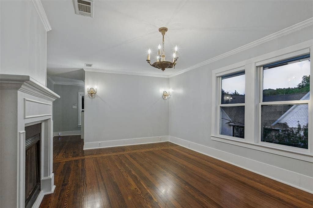 506 W Virginia Street, McKinney, TX 75069 Primary Suite with views of the garden and fireplace