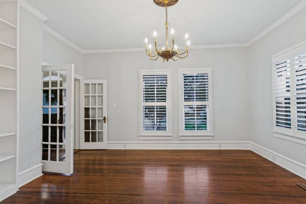 506 W Virginia Street, McKinney, TX 75069 Dining room located in front of the house off main entryway with plenty of built in shelves for storage and decoration