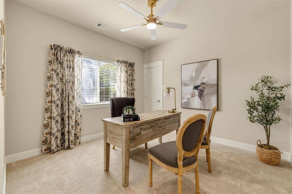 630 Candlewood Trail, Murphy, TX 75094 Single window with blinds, light-toned walls, gold and white ceiling fan, and light-toned carpet flooring
