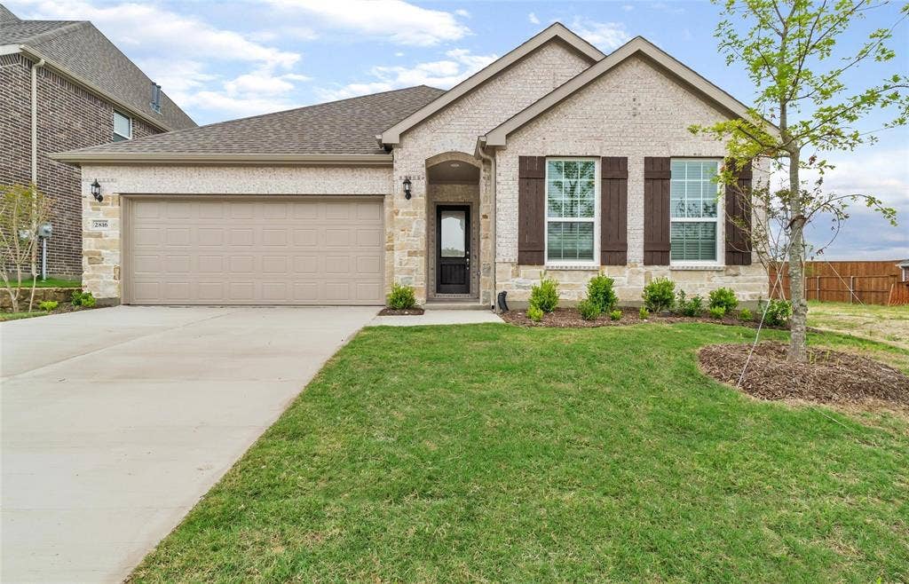 2816 southampton Drive, McKinney, TX 75071 Brick and stone exterior with a two-car garage