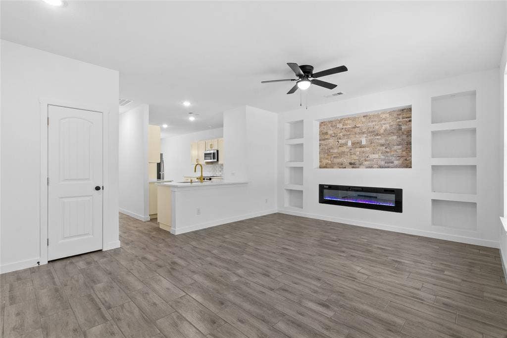 7520 Double Bridge Road, Mabank, TX 75156 Open-concept living space with wood-finish flooring