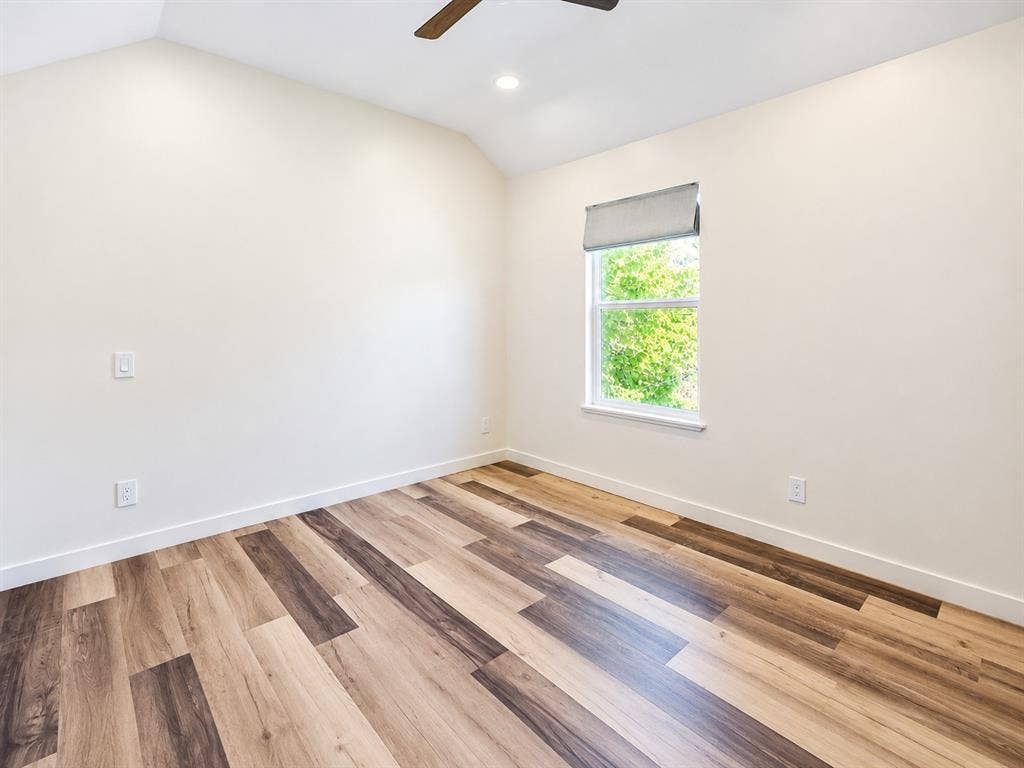 521 York Street, Athens, TX 75751 Vaulted ceiling with recessed lighting and a ceiling fan