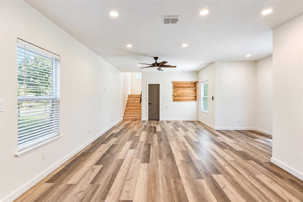 521 York Street, Athens, TX 75751 Open-concept living area featuring wood-finish flooring, recessed lighting, and a ceiling fan