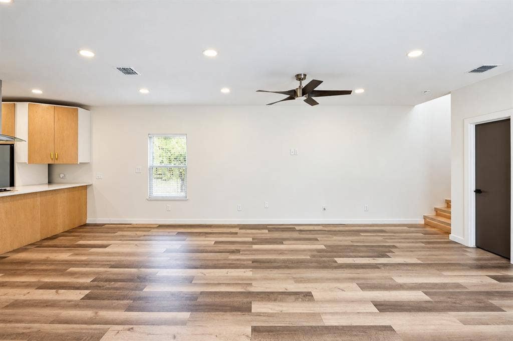 521 York Street, Athens, TX 75751 Wood-finish flooring, recessed lighting, and a modern ceiling fan