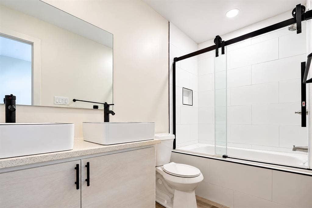521 York Street, Athens, TX 75751 Dual rectangular vessel sinks with matte black faucets