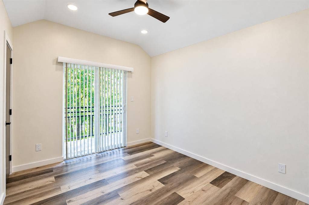 521 York Street, Athens, TX 75751 Vaulted ceiling with recessed lighting and ceiling fan