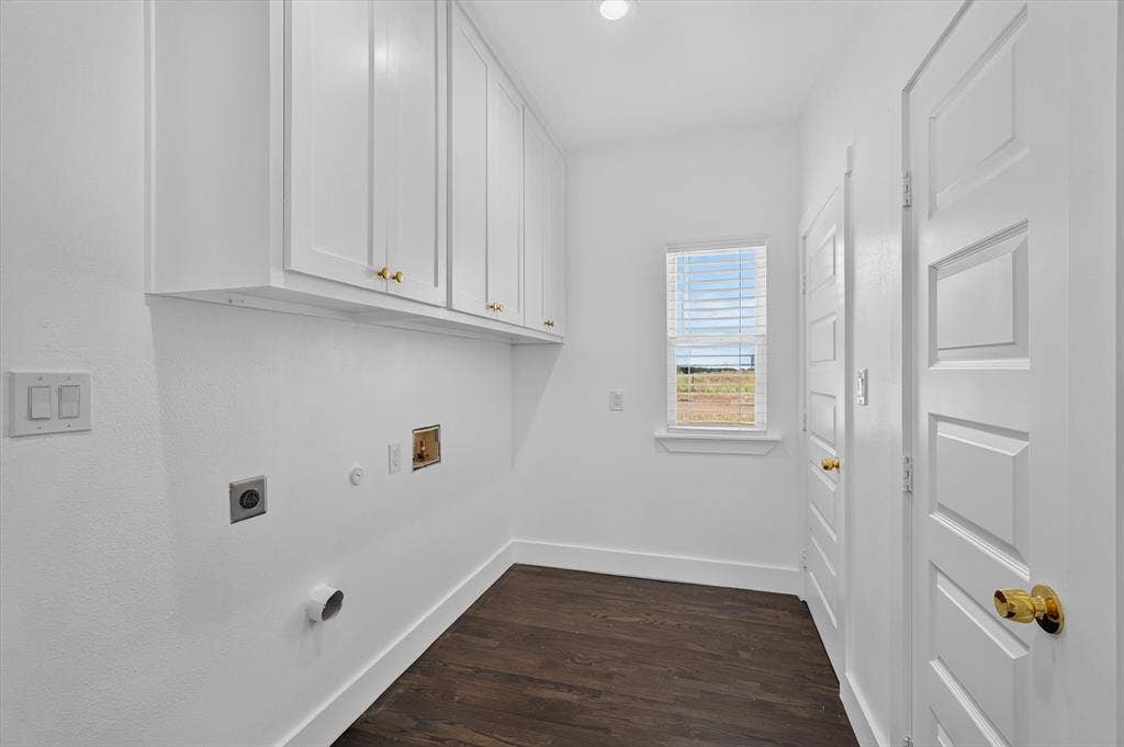 102 Shadywood Road, Trinidad, TX 75163 White cabinetry with gold-tone hardware, wood-finish flooring, recessed lighting, white paneled doors, and a window with blinds
