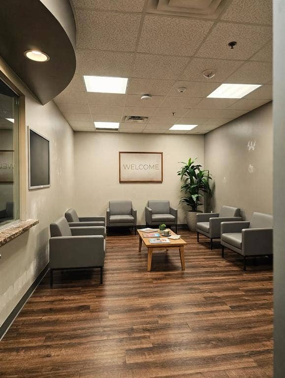 1675 Republic Parkway, #104, Mesquite, TX 75150 Wood-finish flooring with a textured ceiling