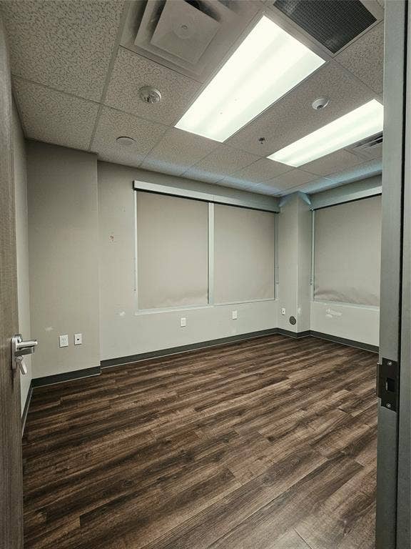 1675 Republic Parkway, #104, Mesquite, TX 75150 Wood-finish flooring, drop ceiling with integrated lighting, window treatments, and neutral wall tones
