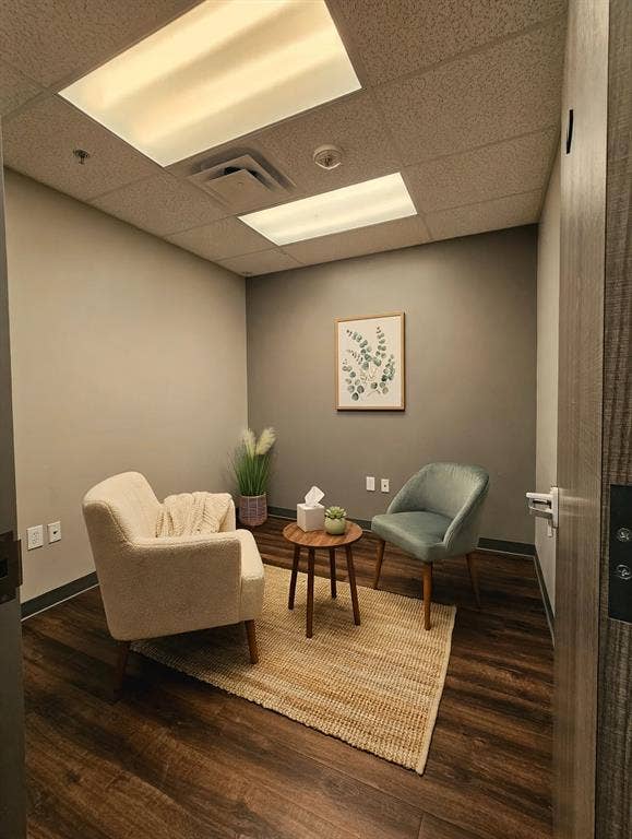 1675 Republic Parkway, #104, Mesquite, TX 75150 Wood-finish flooring with accent wall