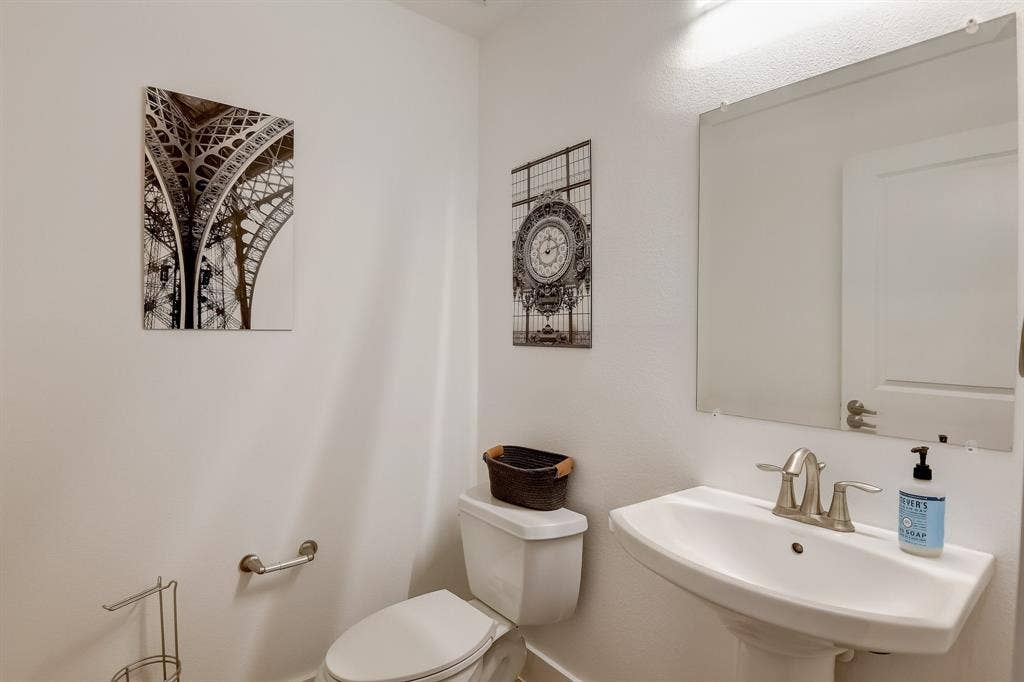 Bathroom with toilet and a sink