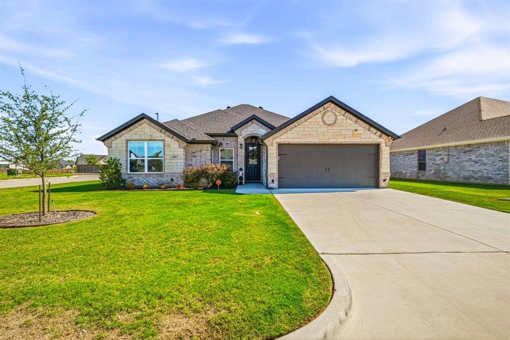 601 Violet Drive, Tolar, TX 76476 Stone and brick veneer exterior with a gabled roof