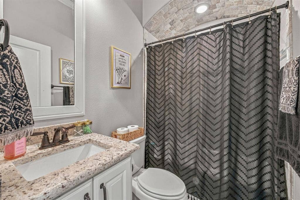 601 Violet Drive, Tolar, TX 76476 White vanity with granite countertop and undermount sink