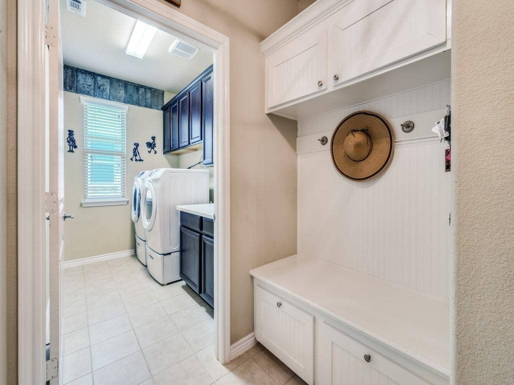 1220 Isabella Lane, Savannah, TX 76227 Laundry room with adjacent mud bench for added function and convenience
