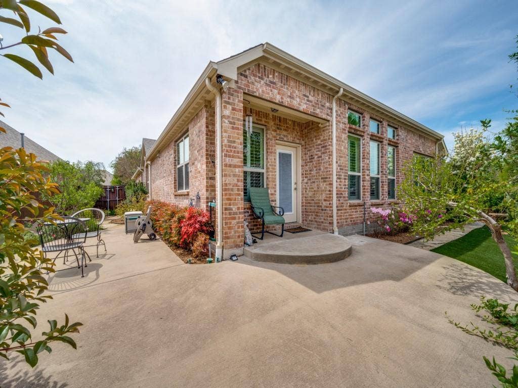 1220 Isabella Lane, Savannah, TX 76227 Extended rear and side patios create exceptional low-maintenance outdoor living space