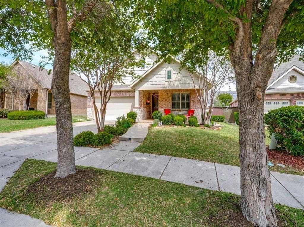 1220 Isabella Lane, Savannah, TX 76227 Classic curb appeal and a front porch made for connecting with neighbors