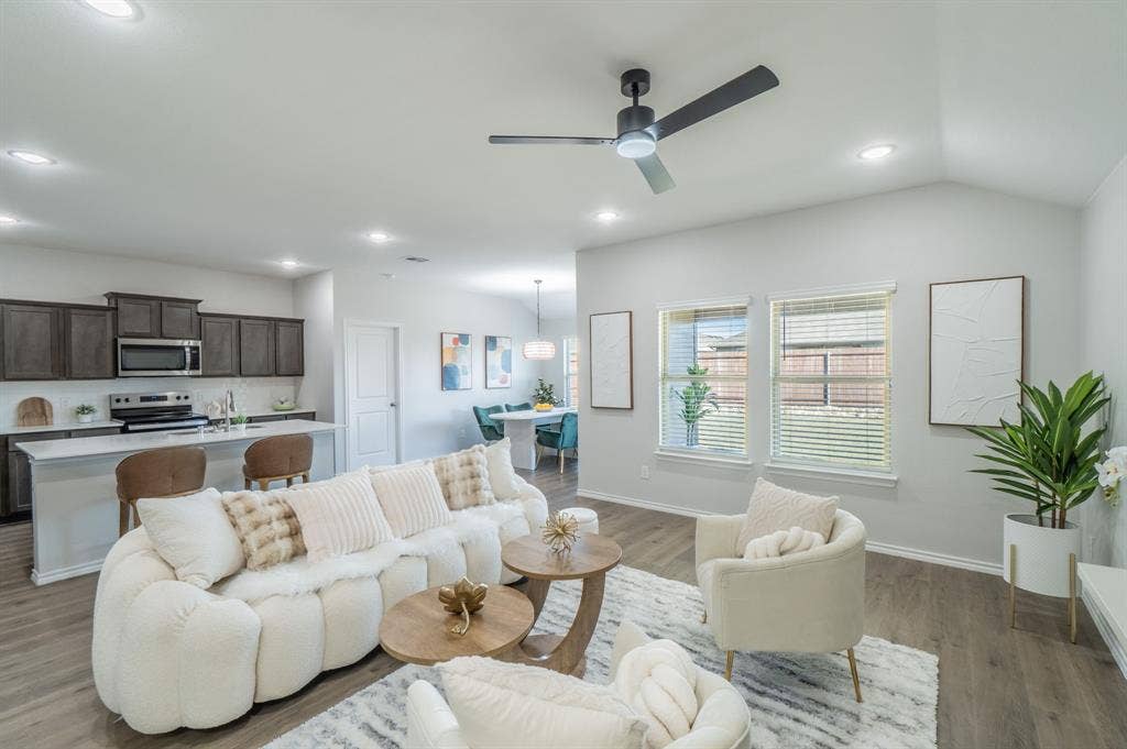 1842 Shady Elm Drive, Lancaster, TX 75146 Open-concept living area featuring wood-finish flooring, recessed lighting, and a modern ceiling fan